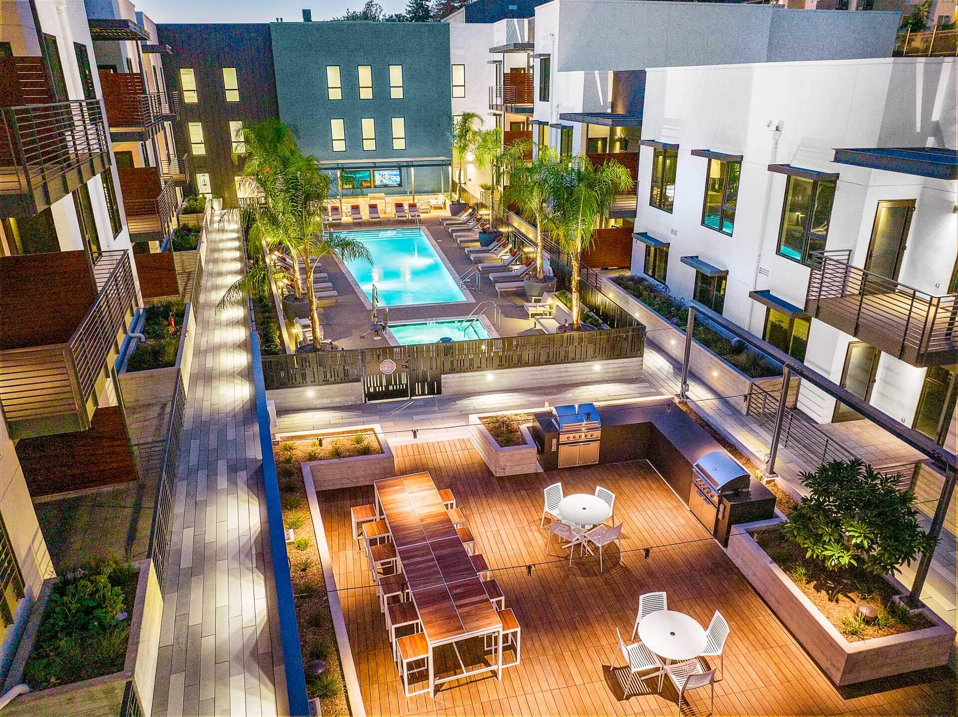 patio overlooking the pool and bbq area